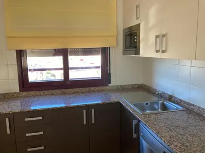 Una cocina o zona de cocina en Edificio Galerias