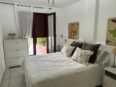 Cama o camas de una habitación en Jardines Nuevo Vera bajo 2 dormitorios vistas al mar