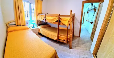 Cama o camas de una habitación en Bajo VERAMAR 5 Vera Playa primera línea de playa