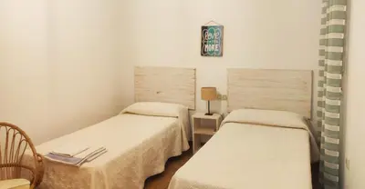 Cama o camas de una habitación en Casas Maria Carmona