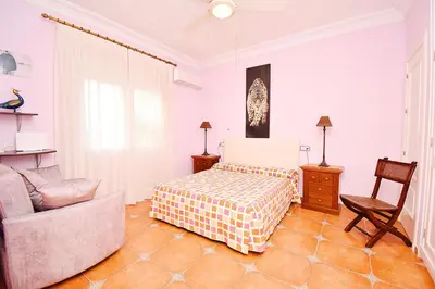 Cama o camas de una habitación en Expoholidays Vistas al mar - A pie de playa