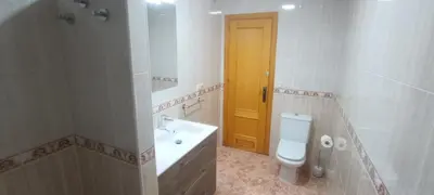 Un baño de Ático en Buenavista playa