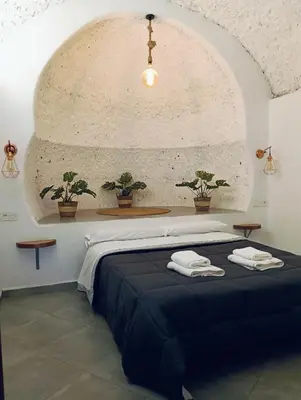 Cama o camas de una habitación en La Madriguera Eco Caves 3