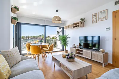 Una televisión o centro de entretenimiento en Apartamento El Castillo