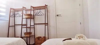 Cama o camas de una habitación en Vistas mar y montaña LasNegras