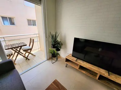 Una televisión o centro de entretenimiento en Apartamento La Gambita de Garrucha