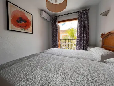 Cama o camas de una habitación en Apartamento ESQUINA VERDE en Vera Coast