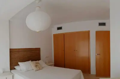 Cama o camas de una habitación en Vera playa Puerto Rey Mar, piscina y ubicación inmejorable