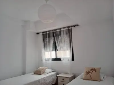 Cama o camas de una habitación en Vera playa Puerto Rey Mar, piscina y ubicación inmejorable