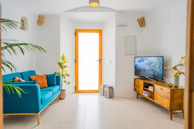 Una televisión o centro de entretenimiento en Casa Lua Galera