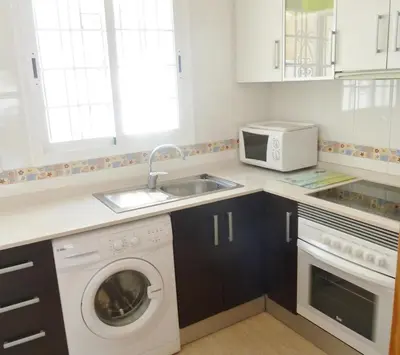 Una cocina o zona de cocina en La Diosa Gaia in San Juan de los Terreros