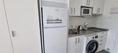 Una cocina o zona de cocina en Tropicana playa