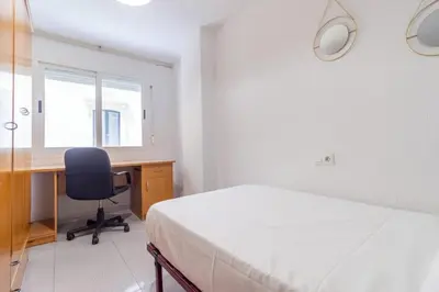 Cama o camas de una habitación en Precioso apartamento en el corazón de la ciudad-Wifi-Aire Acondicionado