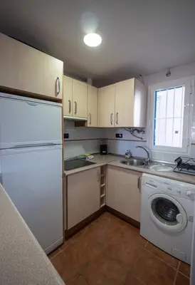 Una cocina o zona de cocina en Apartamento Cala Grande