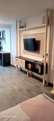 Una televisión o centro de entretenimiento en Escapada a Vera