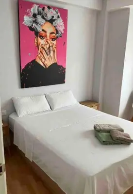 Cama o camas de una habitación en Tu Playa y tu Casa con terraza