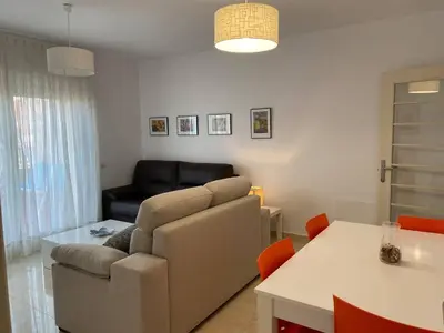 Zona de estar de Brisamarina Playa Apartamento