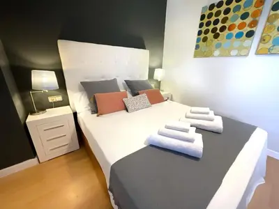 Cama o camas de una habitación en KS Golf Playa - Kaleria Suites