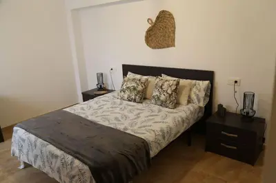Cama o camas de una habitación en Algo diferente frente al mar