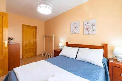 Cama o camas de una habitación en Rincón Levante Águilas, cerca de la playa- by Aloha Palma