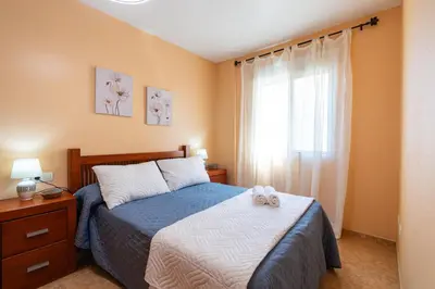 Cama o camas de una habitación en Rincón Levante Águilas, cerca de la playa- by Aloha Palma