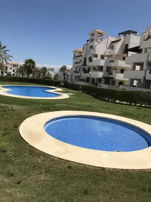 Piscina en o cerca de Apartamento increible, Playazo de Vera, 3 habitaciones, segunda línea de Playa