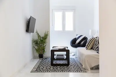 Zona de estar de Trendy Homes Alfarerías