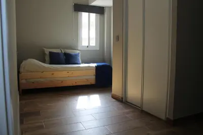 Cama o camas de una habitación en The Paradise