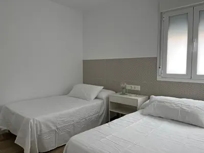 Cama o camas de una habitación en HELICES CENTRO SAN JOSE CABO DE GATA