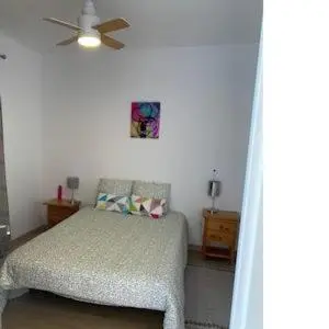 Cama o camas de una habitación en Las Casas Rurales de Los Olivos