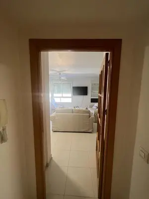 Una televisión o centro de entretenimiento en ESTUDIO PLAYA LA BAJADILLA Roquetas de mar