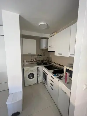 Una cocina o zona de cocina en ESTUDIO PLAYA LA BAJADILLA Roquetas de mar