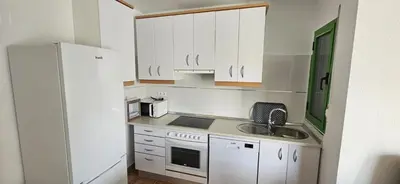Una cocina o zona de cocina en Casa Neptuno