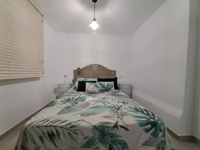 Cama o camas de una habitación en Nueva Almería beach & chill