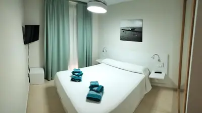 Cama o camas de una habitación en Apartamento Como en Casa - Cala Marqués - Vera Playa