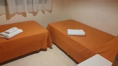 Cama o camas de una habitación en Apartamento Costa Rey VERARENTAL.COM a 100 metros de la playa