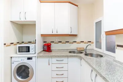 Una cocina o zona de cocina en Trendy Homes Catedral