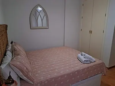 Cama o camas de una habitación en La casa de la fama - Apartamento con patio exterior