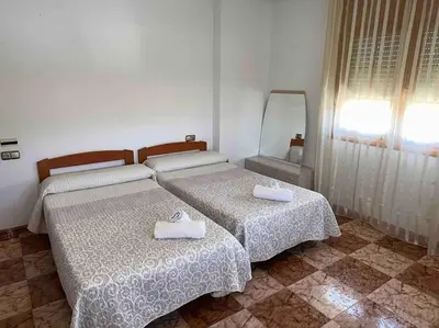 Cama o camas de una habitación en Casa Rural Baza