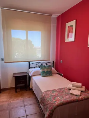 Cama o camas de una habitación en HOSTAL TREVELEZ