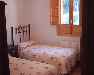 Cama o camas de una habitación en Casa Rural El Olivo. Alpujarra.