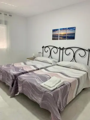 Cama o camas de una habitación en EL SOL ANDALUZ - CASA GOYA