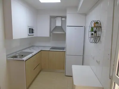 Una cocina o zona de cocina en Aguadulce familiar y económico, Piscina Playa Wifi