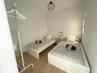 Cama o camas de una habitación en Apartamento Cine Wifi