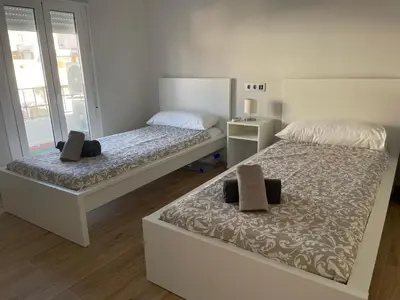 Cama o camas de una habitación en Apartamento Cine Wifi