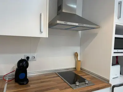 Una cocina o zona de cocina en Apartamento Cine Wifi