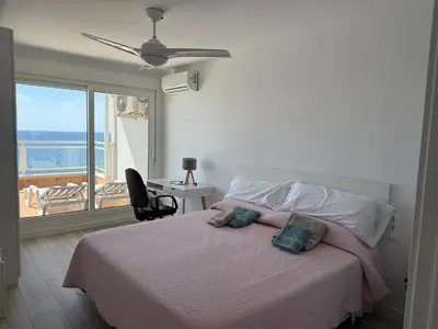 Cama o camas de una habitación en Ático con garaje en 1º línea de playa Almería