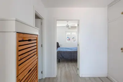 Cama o camas de una habitación en Ático con garaje en 1º línea de playa Almería