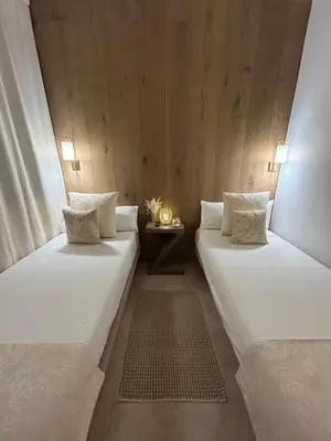 Cama o camas de una habitación en Zen Garden Apartment