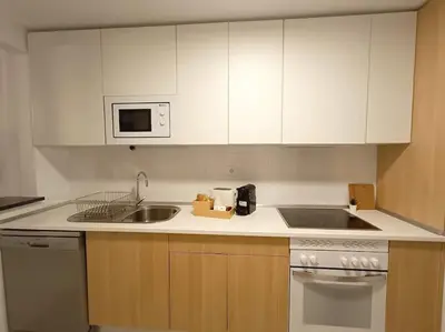 Una cocina o zona de cocina en Alejandría Suites Aguadulce Sur, 2Hab, terraza, WiFi, Piscina y garaje